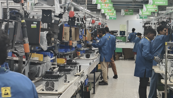 Assembly Workers in Production Plant in India